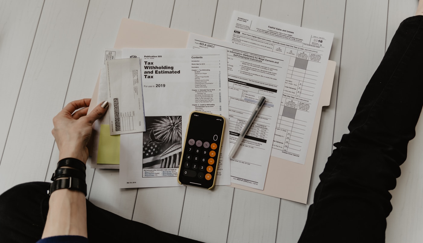 Financial planning consultation with documents and calculator
